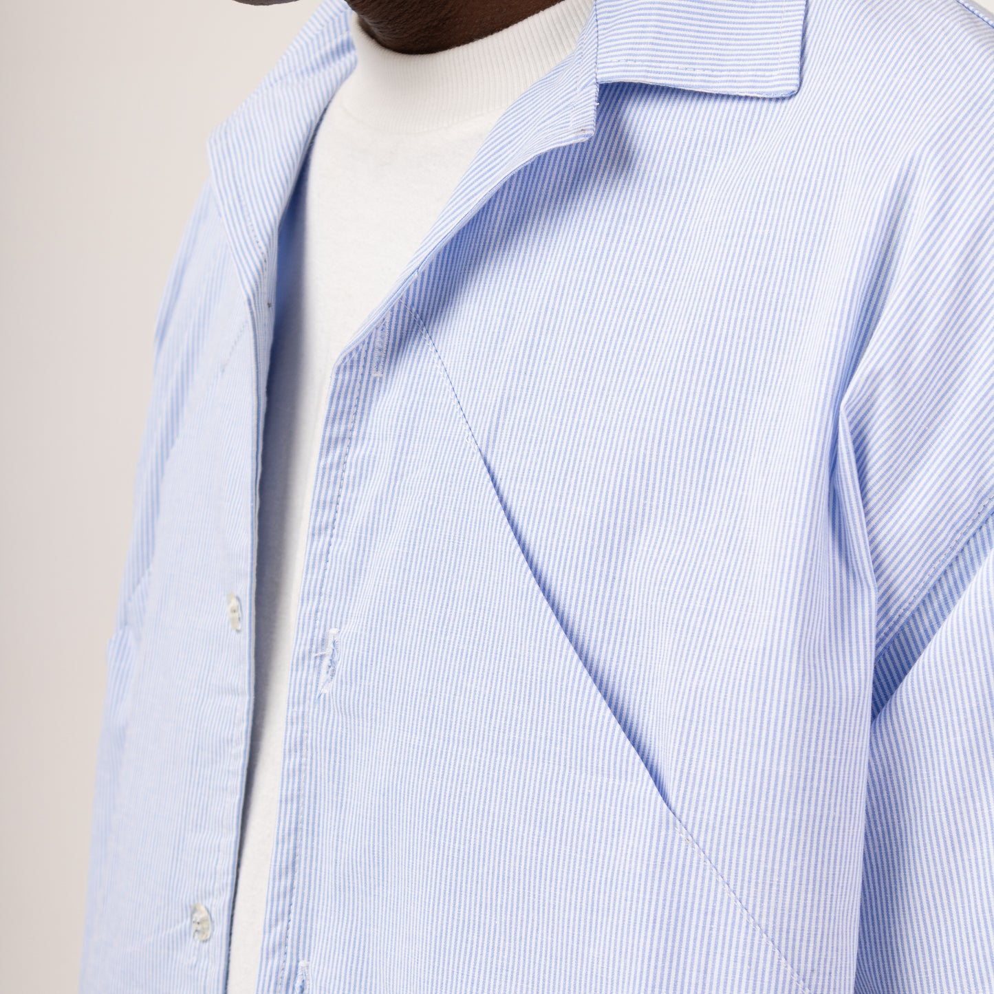 CAMISETA BOX BOTÃO “FOLD”