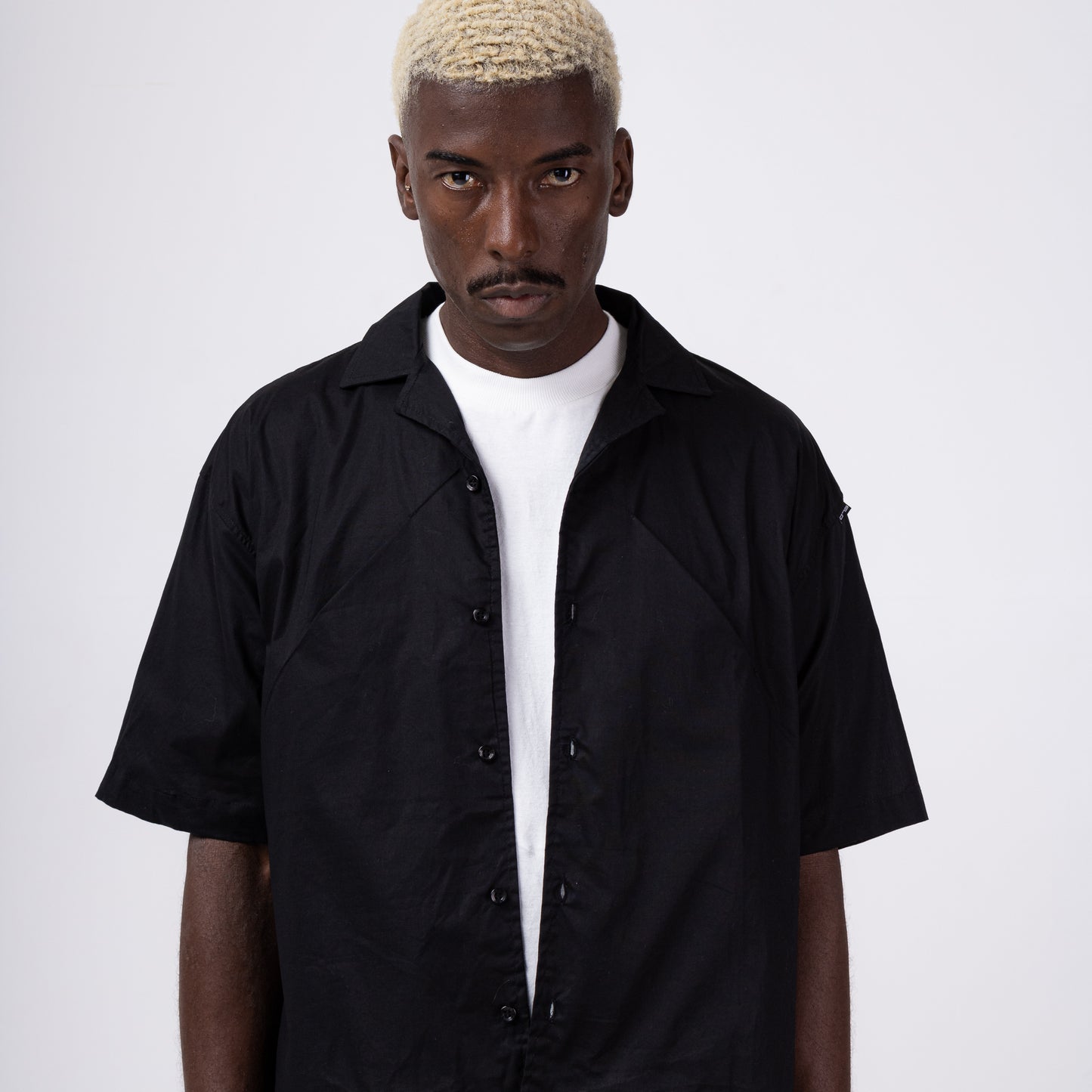 CAMISETA BOX BOTÃO “FOLD”