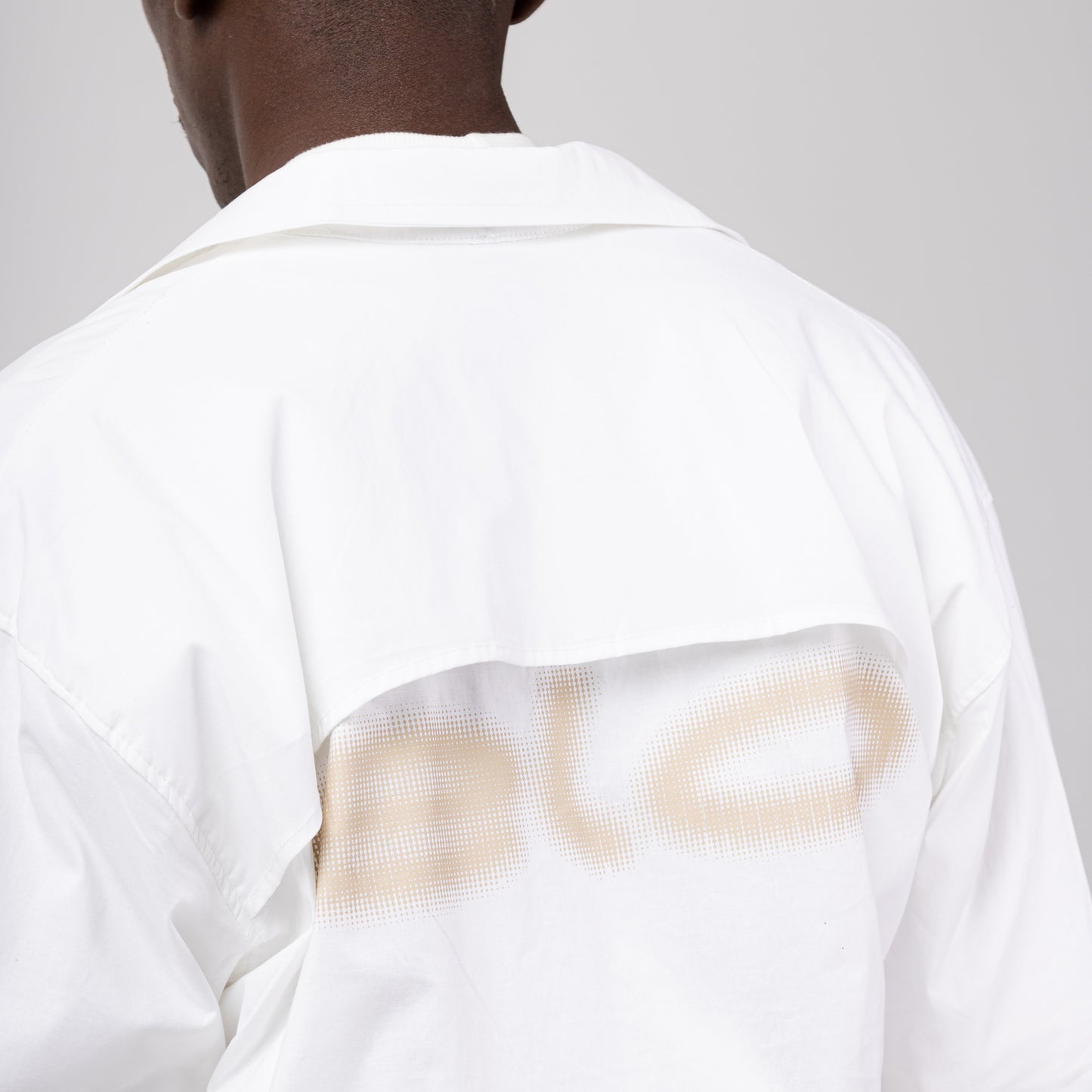 CAMISETA BOX  BOTÃO “FOLD”